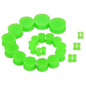 Neon green silicone double flare ear gauges set arranged in a spiral on white background