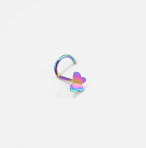 Detailed macro view of an L-shaped iridescent rainbow butterfly nose stud in stainless steel