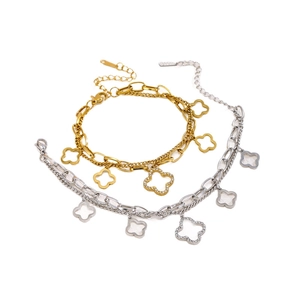Double-layered clover bracelet set in gold and silver finish with zircon inlay
