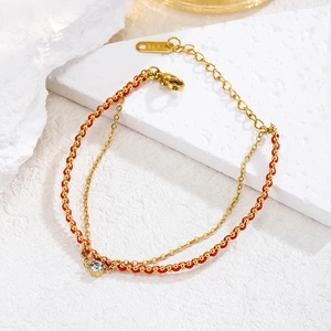Double-layer woven red rope and gold titanium steel bracelet with single zircon stone