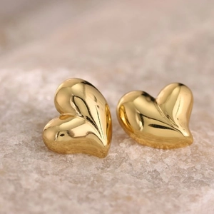 Elegant 3D heart-shaped gold stud earrings in polished stainless steel for women