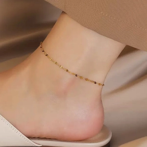 Elegant 18k gold plated titanium steel lip chain anklet for women on a model ankle
