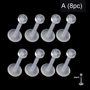 Macro detail of 8pc transparent acrylic piercing studs showing the plug-in connection design