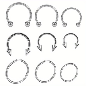 Set de 9 joyas corporales de acero inoxidable en estilos de herradura y anillo cautivo