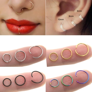 Set de 9 piercings de nariz de acero inoxidable tipo herradura en varios tamaños y colores