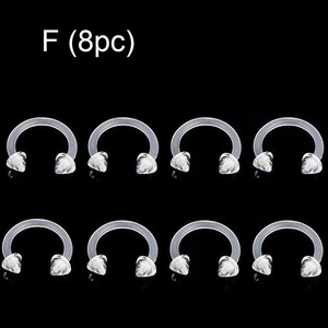 Detailed set of 8 clear acrylic horseshoe rings with spiked ends for body piercing
