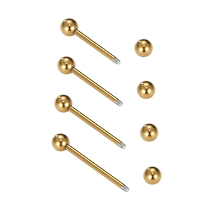 Macro shot of 8-piece gold stainless steel tongue barbells and balls for body piercing