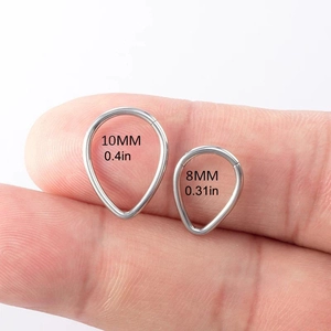Polished stainless steel teardrop nose hoops in 8mm and 10mm sizes shown on fingertips