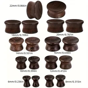 Matrice d'écarteurs en bois concave en neuf tailles de 6mm à 22mm sur fond blanc