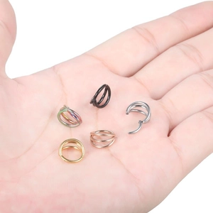 Set of multi-layered stainless steel nose rings in silver, black, gold, and rose gold finishes