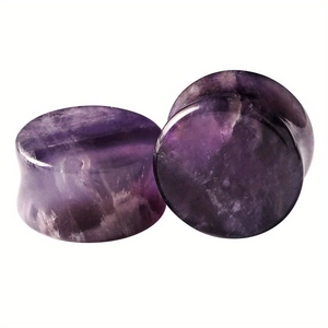 Pair of double flared amethyst stone ear plugs with natural purple crystal textures