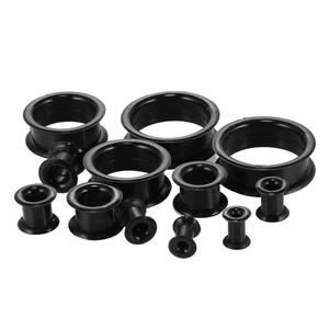 Set of black silicone hollow ear tunnels and plugs in various sizes for body piercing