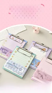 Detail of A6 pocket clipboards with colorful pastel notepad pages and metal clips