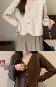 Detail view of the V-neck knit cardigan with marble-textured buttons in beige and brown
