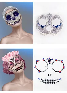 Detail view of H3 and H4 Halloween face gems with blue, red and black rhinestones
