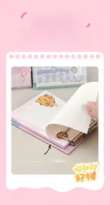 Close-up of A6 mini binder notepad featuring refillable metal rings and cute bear illustrations