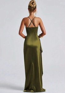Detail of olive green satin dress featuring criss-cross back straps and draped fabric