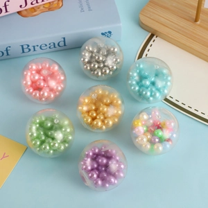 Stress relief squishy balls filled with colorful pearls in clear shells, seven piece set