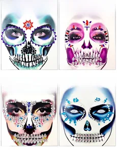 Detail view of four Halloween skull face crystal stickers in multi-color resin rhinestones