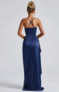 Detail of elegant navy satin dress showing cross back straps and invisible zipper back
