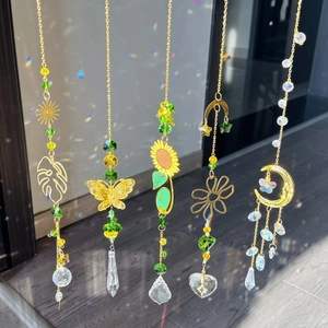 Set of 5 golden crystal suncatchers with moon, butterfly and sunflower prism pendants