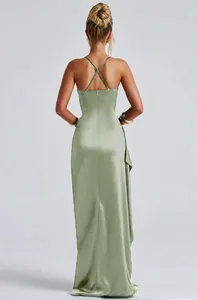 Detail view of the criss-cross back straps on a sage green satin evening dress