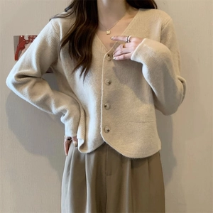 Elegant off-white V-neck knitted cardigan for women featuring refined single-breasted buttons