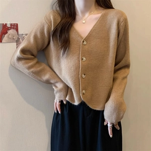 Women's V-neck camel knit cardigan with wood buttons and vertical ribbed texture