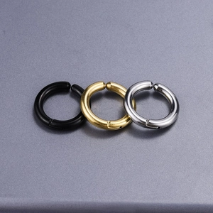 Three-color set of stainless steel hoop earrings in black, gold, and silver finishes