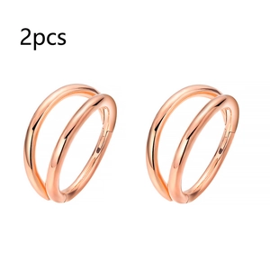 Detail of two rose gold double-layer stainless steel nose rings with polished finish