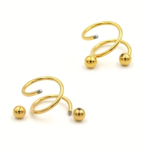 Paire de piercings labret spirale dorés en acier inoxydable avec embouts à bille