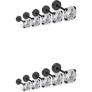 Gros plan de cinq tailles de boucles d'oreilles en acier noir avec zircons blancs clairs