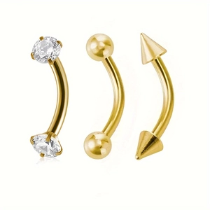 Trois barres courbées en acier doré avec zircon, boules et pointes de piercing