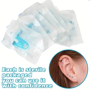Detailed view of sterile disposable ear piercing units in blue with individual packaging