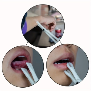 White disposable body piercing forceps showing ear, tongue and lip usage in three views