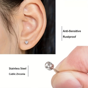 Minimalist stainless steel stud earring with cubic zirconia shown in wear and detail