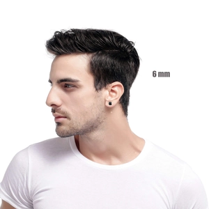 Detailed close-up of a 6mm black zircon magnetic stud earring worn on a male ear