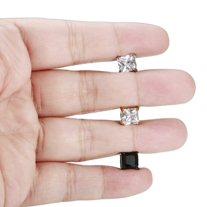 Magnetic stainless steel square stud earrings with CZ stones shown for size scale