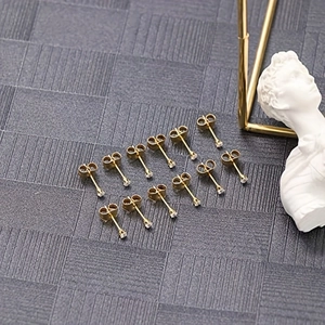 Set of 14 pairs golden stainless steel stud earrings with round clear zircon stones
