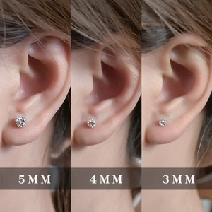 Size comparison of 3mm, 4mm, and 5mm silver stud earrings with sparkling cubic zirconia