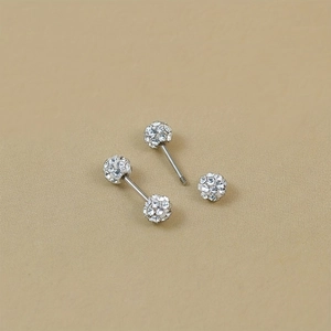 Detail view of Shamballa ball stud earrings showing the threaded screw-on closure