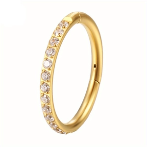 Detailed side view of golden stainless steel clicker hoop ring with pavé cubic zirconia
