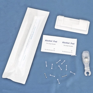 Kit de piercing 18 pièces en acier inoxydable avec tiges en acrylique, pinces et tampons