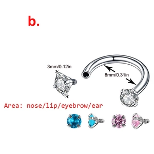 Detail van 8mm roestvrijstalen ring met 3mm blauwe en roze zirkonia steentjes
