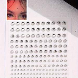 Silver non-piercing facial stud stickers with multiple sizes and metallic finish