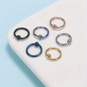Set of six colorful stainless steel captive bead rings with polished finish for piercings
