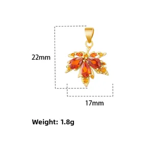Colgante hoja de arce en oro de 18k con circonitas naranjas, 22 mm por 17 mm