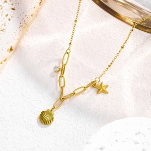 Exquisite 18K vergoldete Titanhalskette mit Seemuschel Seestern und Zirkon Anhängern