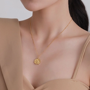 French vintage 18K gold plated necklace with irregular round embossed pendant
