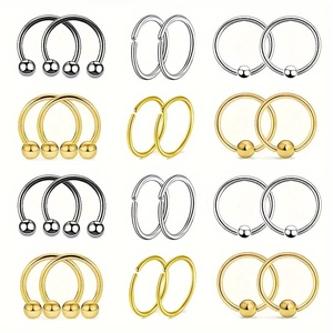 Macro shot of 24pcs stainless steel nose ring set in gold, silver, and black finish
